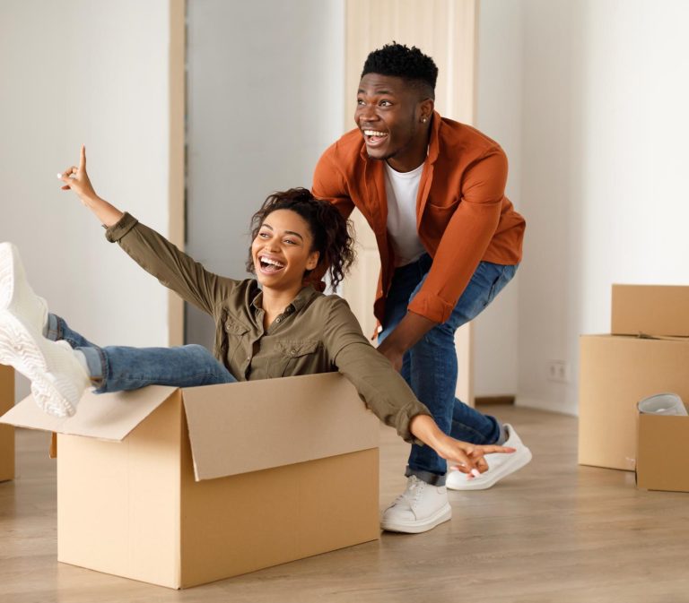 Couple enjoying their move into a new home